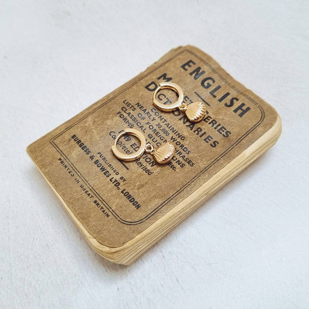 Gold Seashell Huggie Earrings in a bottle