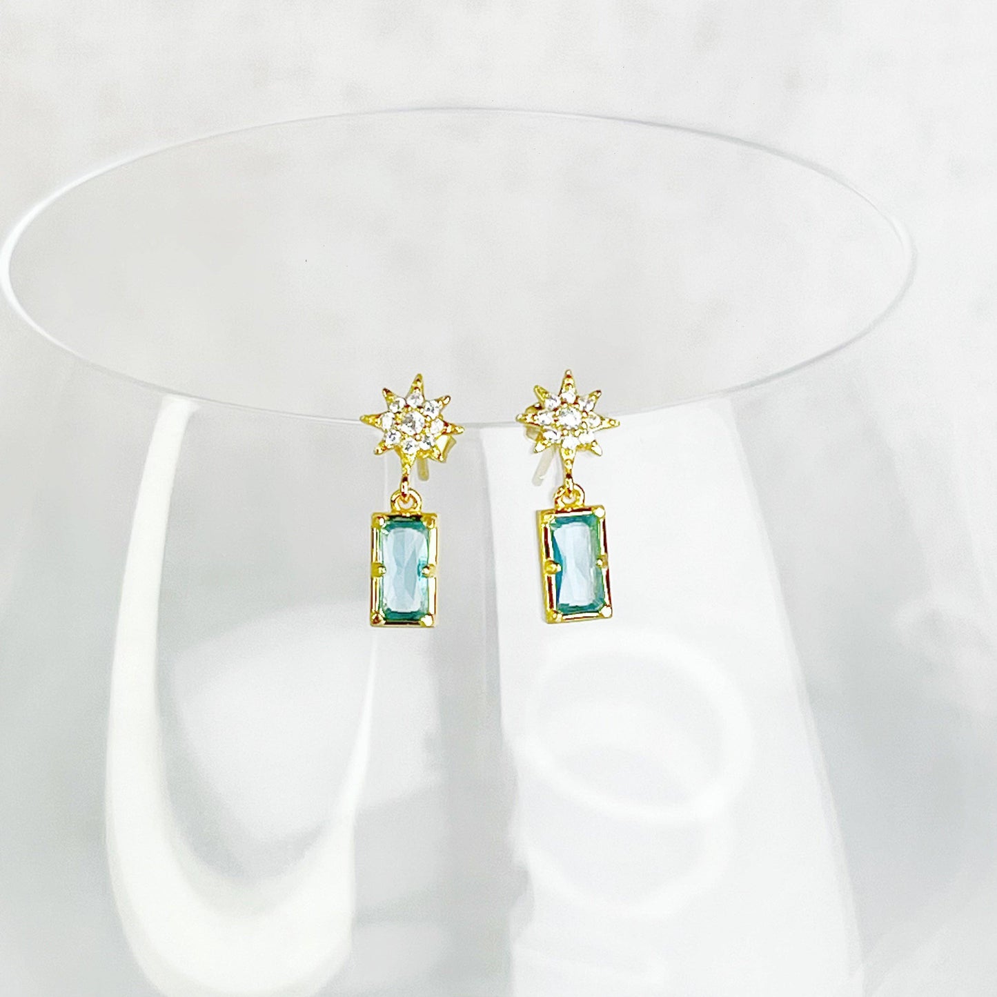 Ninaouity Gold Pole Star and Blue Square Crystal Earrings