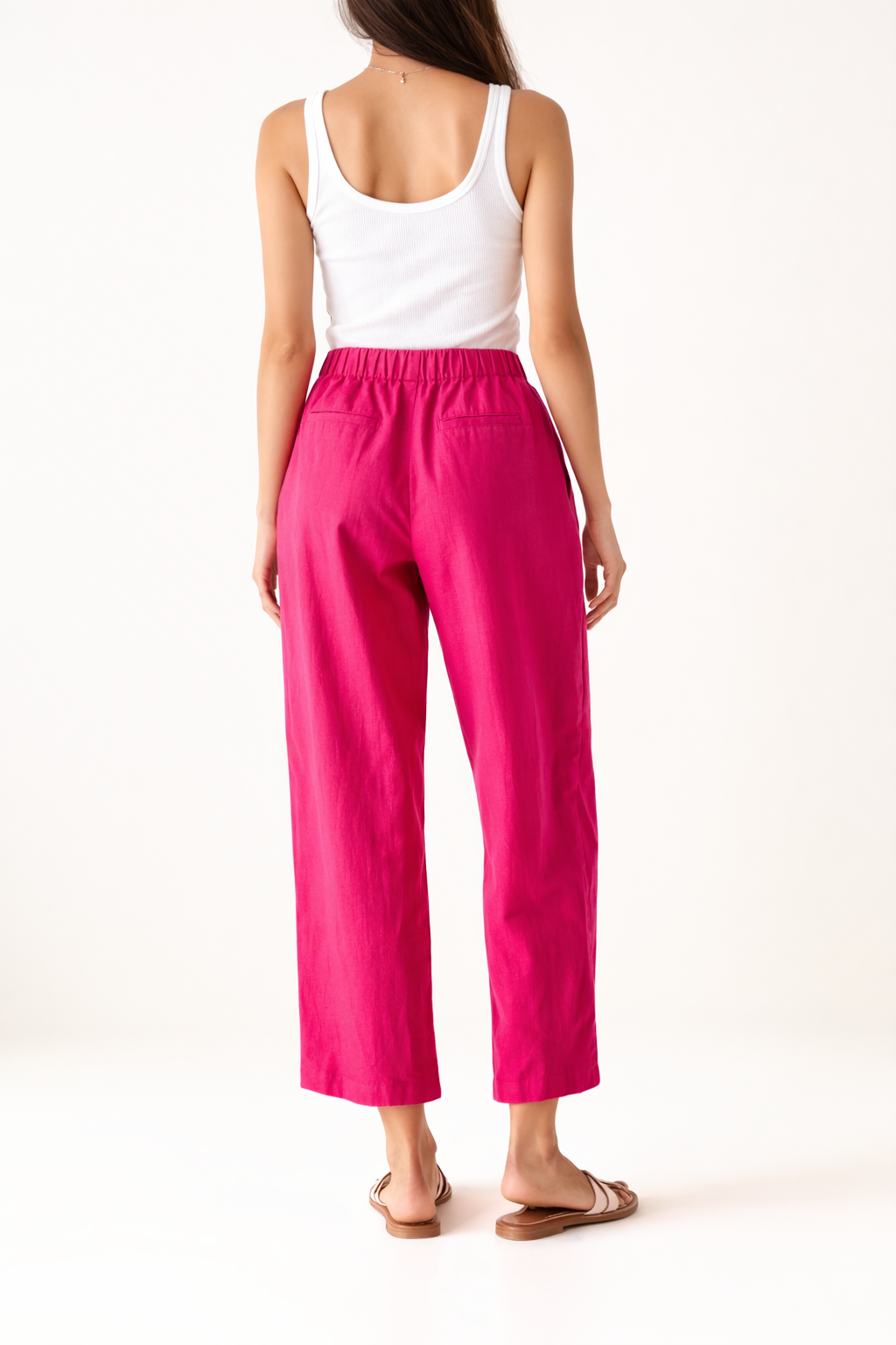 100 % cotton fuschia pink elasticated waist &nbsp;trousers with pockets in side and back. Drawstring detail .&nbsp;