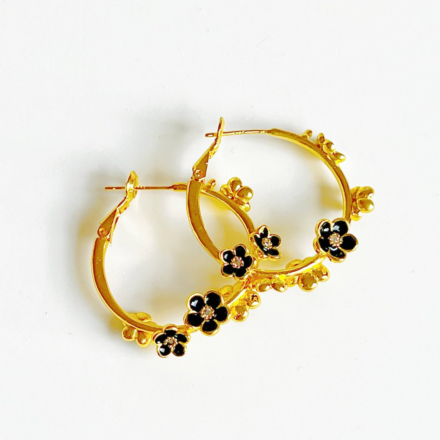 Ninaouity Black Flowers in Gold Hoop Earrings