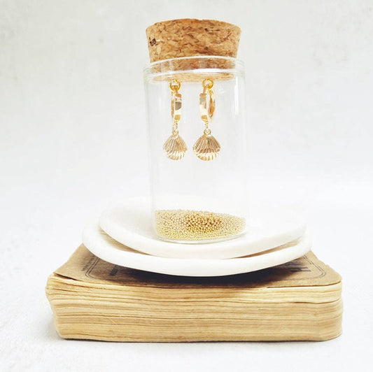Gold Seashell Huggie Earrings in a bottle