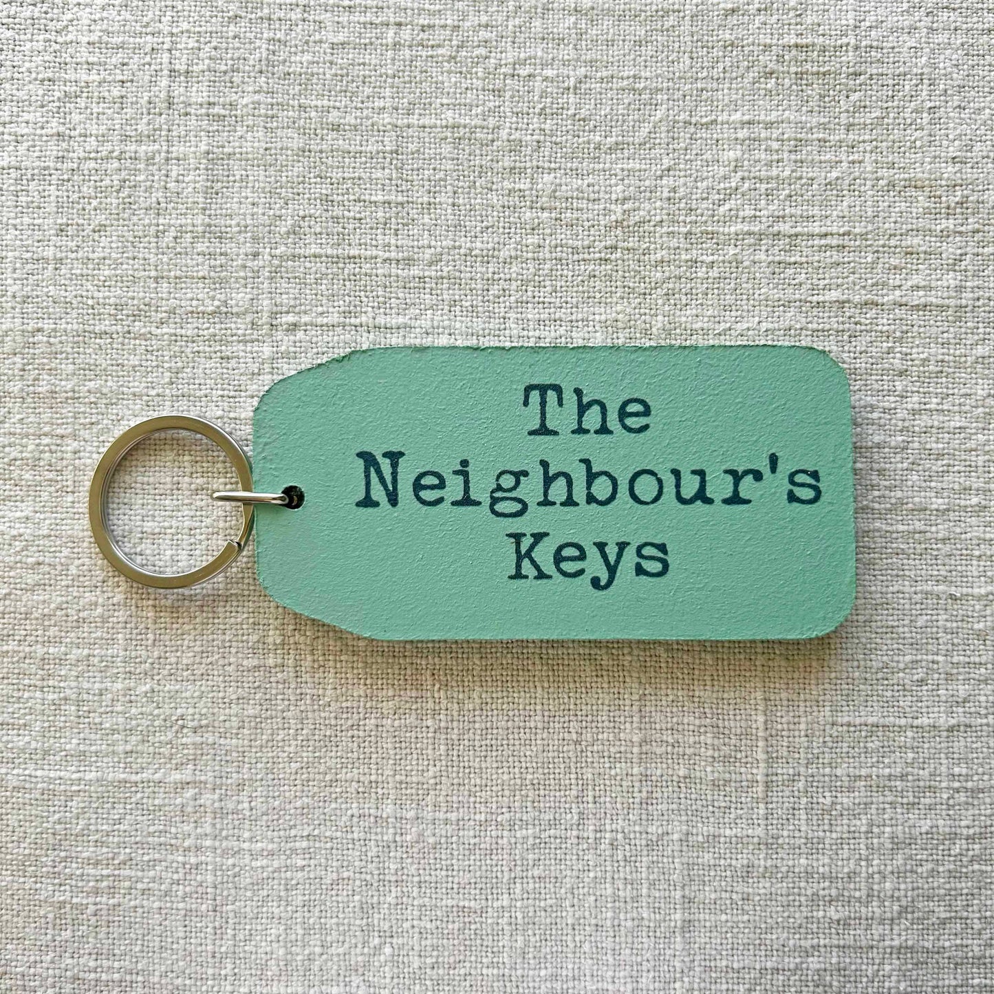 The Wooden Postcard Company - THE NEIGHBOUR'S KEY Wooden Key Tag