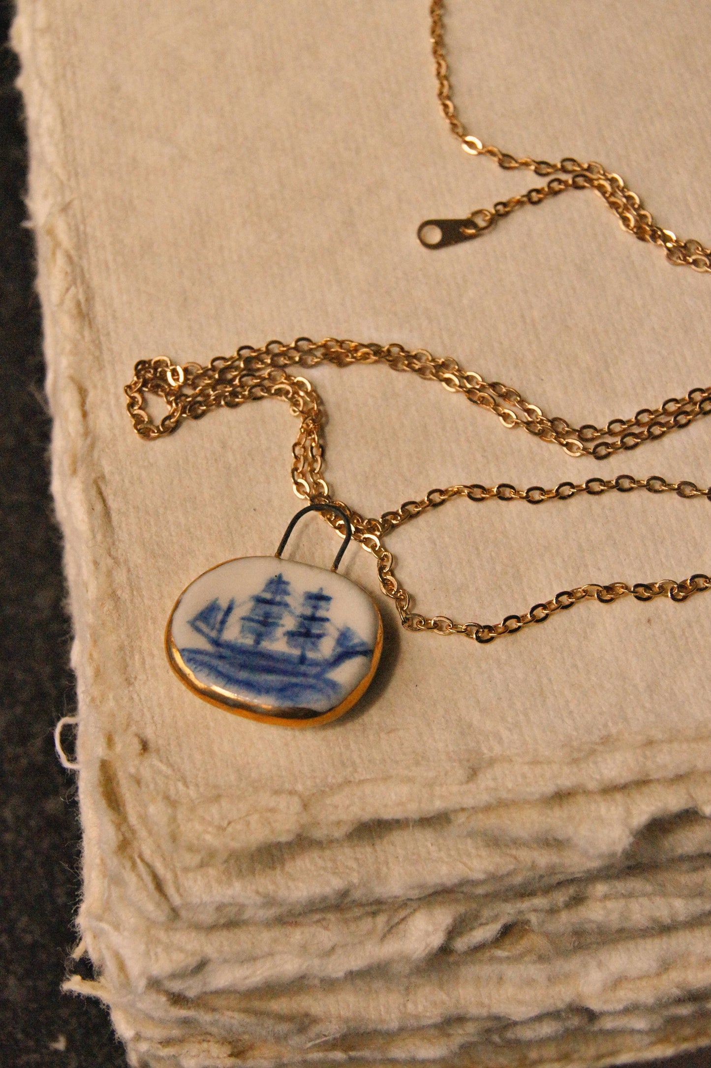 Porcelain Ship Pendant with 24 karat Gold Lustre