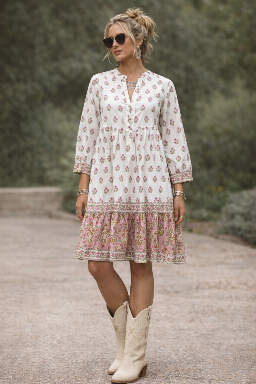Wood block printed cotton voile dress in soft cream and pink .