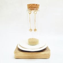 Zamsoe - Gold shell oval hoop earrings in bottle