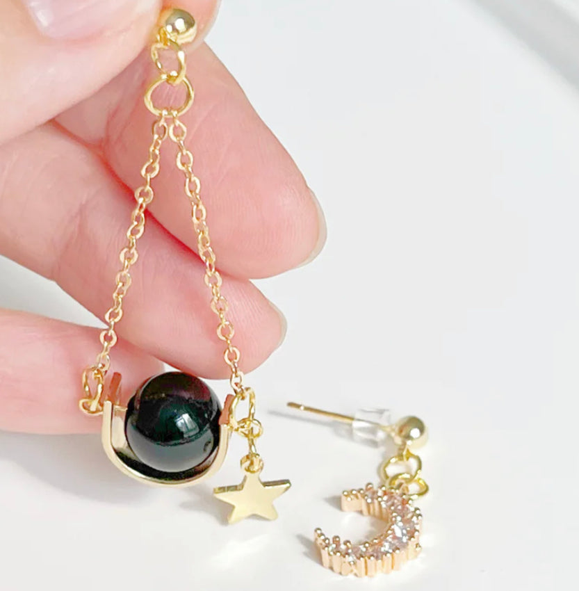 Nina Ouity Solar System Star and
Moon Mismatch Earrings