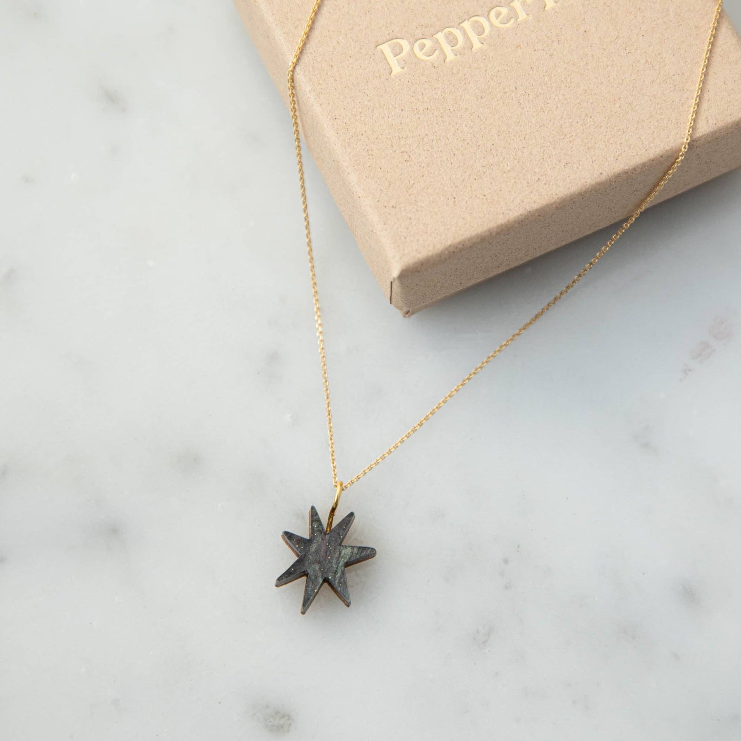 Pepper You Hand Drawn Star Gold Necklace in Smoke Black Sparkle: Marble Teal Sparkle