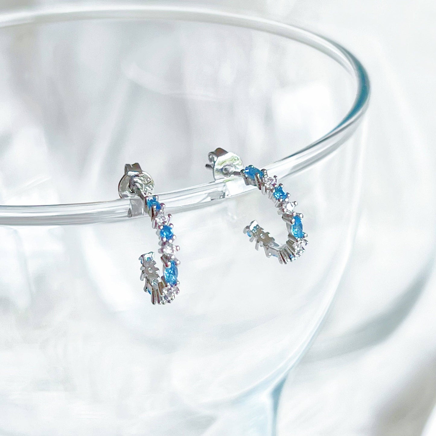 Ninaouity - Silver Blue Topaz Mini Hoop Earrings - December Birthstone