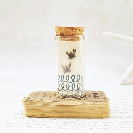 Zamsoe - Quirky crab stud earrings in a bottle