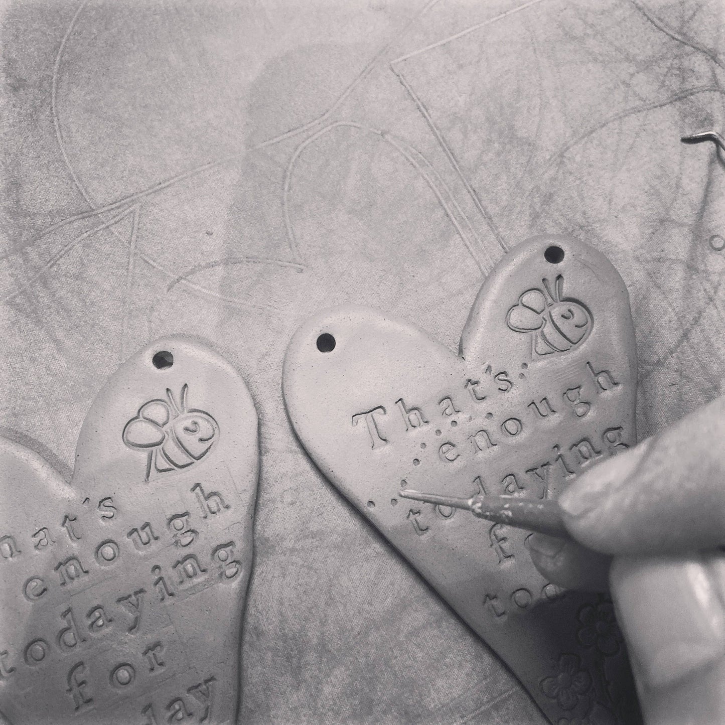 Stay Wild Ocean Child ceramic hanging heart. Made in Wales.