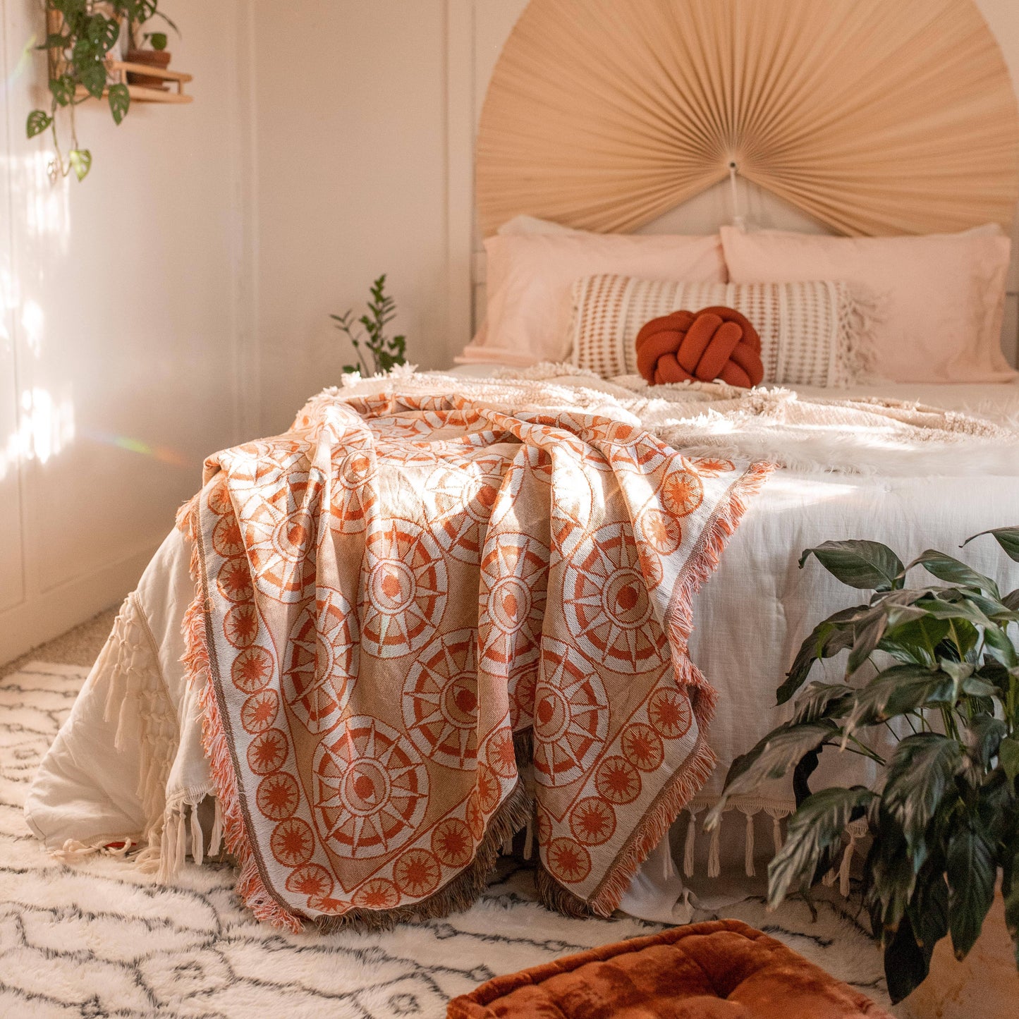 The Nazar Woven Blanket in Peach